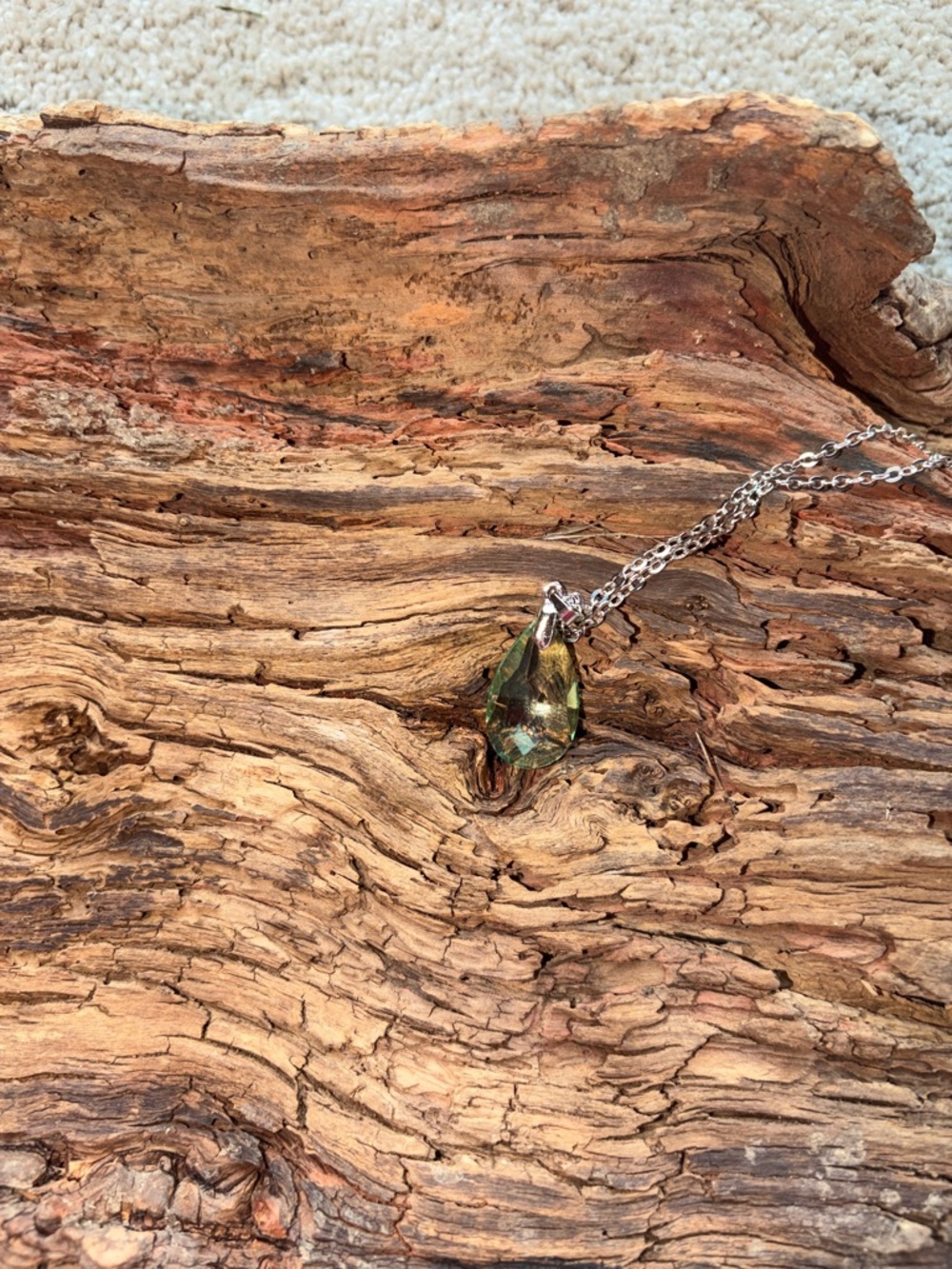 Teardrop Crystal Pendant Necklace in light green.
